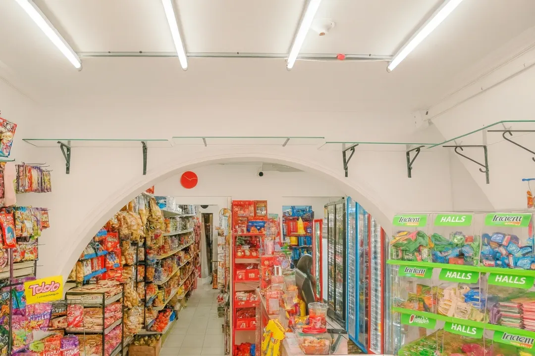 Interior of a convenience store showcasing snacks and drinks